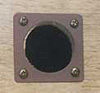 Metal hole restrictor.